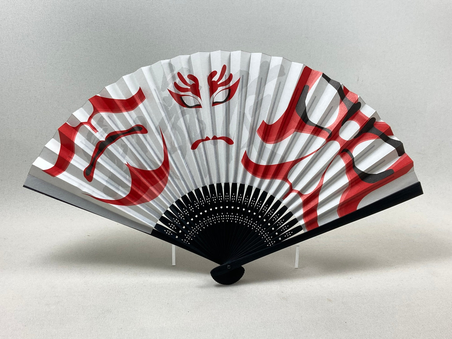 A fan with picture of kabuki theater's characteristic kumadori-style makeup