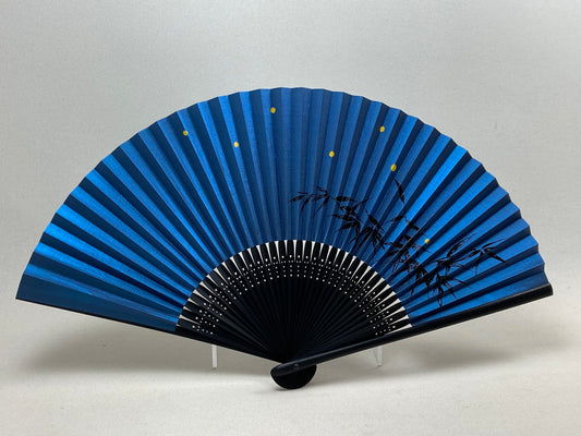 Blue fan with a picture of a yellow firefly flying.